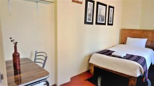 Llit o llits en una habitació de Eco Aventura Hostel Cusco