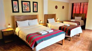 Llit o llits en una habitació de Eco Aventura Hostel Cusco