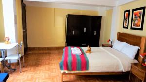 Llit o llits en una habitació de Eco Aventura Hostel Cusco