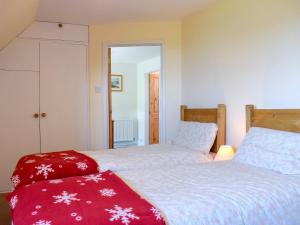 Łóżko lub łóżka w pokoju w obiekcie Sea View Lodge