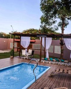 Casa_praia_Laphina - Frente do mar com piscina!游泳池或附近泳池