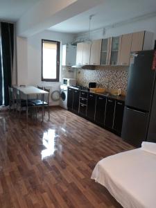 Kuchyň nebo kuchyňský kout v ubytování Aquazure Residence + 6 fotografií