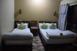 Postel nebo postele na pokoji v ubytování Hotel Garangja