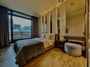 Here Hotel 宅這兒私宅-屏市B宅客房内的一张或多张床位