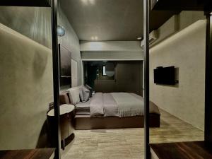 Here Hotel 宅這兒私宅-屏市B宅客房内的一张或多张床位