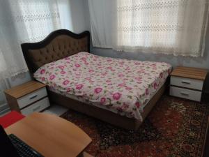 Giường trong phòng chung tại Cute Apartment Daily Weekly Holiday Home Rooms - BE MY GUEST
