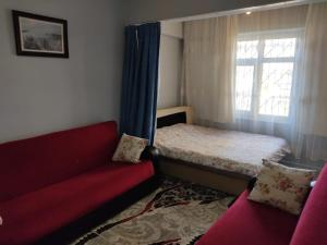 Giường trong phòng chung tại Cute Apartment Daily Weekly Holiday Home Rooms - BE MY GUEST