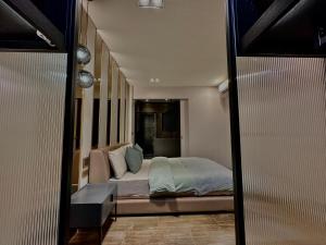 Here Hotel 宅這兒私宅-屏市B宅客房内的一张或多张床位