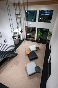 an overhead view of a room with tables and chairs at plainn by negura in Bungotakada