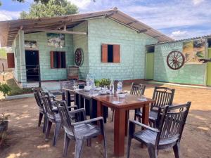 A restaurant or other place to eat at Jungle House and Camping Tents