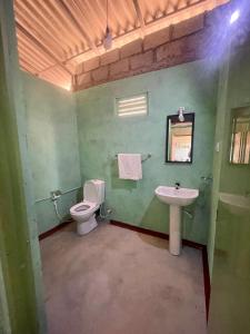 A bathroom at Jungle House and Camping Tents