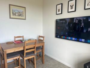 TV o dispositivi per l'intrattenimento presso Freyjas Guest Suite