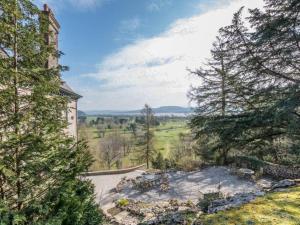 an aerial view of a house with trees at Pass the Keys Yew Tree Stunning Apartment with Sea View in Grange Over Sands
