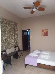 Postel nebo postele na pokoji v ubytování GIOTAS APARTMENTS - STUDIOS