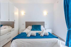 A bed or beds in a room at Casa del Sol