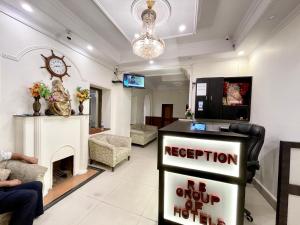 a waiting room with a reception desk and a waiting room at CENTRAL HOTEL by RB group Mall Road-prime-location in-front-of-naini-lake hygiene-and-spacious-room in Nainital