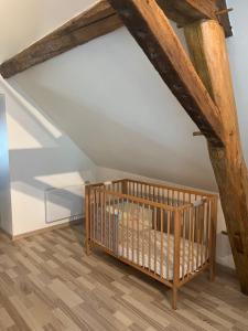 Posteľ alebo postele v izbe v ubytovaní Maison chaleureuse au cœur du perche sarthois + 26 fotografií