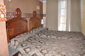 Postel nebo postele na pokoji v ubytování Hôtel Transatlantique