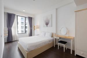 MH Apartment- Tresor- spacious and cozy center D4房間的床