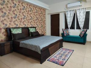 Ліжко або ліжка в номері The Ganges View Luxury Penthouse by iTvara