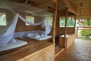 Postel nebo postele na pokoji v ubytování Hijo Resorts Davao + 37 fotografií