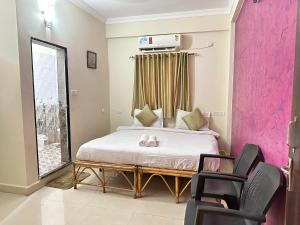 Posezení v ubytování Hotel Leela Inn Candolim