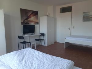 Postel nebo postele na pokoji v ubytování Apartment mit Balkon in Lünen