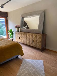 TV a/nebo společenská místnost v ubytování Megina Lodge