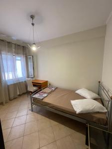 Postel nebo postele na pokoji v ubytování Bados House + 15 fotografií