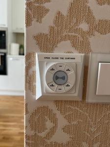 a electrical outlet on a wall in a kitchen at Antakalnis 5 stars apartment in Vilnius