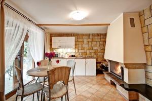 Kuchyň nebo kuchyňský kout v ubytování Apartamenty Tatrzańskie Widoki