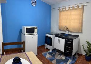 Η κουζίνα ή μικρή κουζίνα στο Dith's House (kitnet 1) +4 φωτογραφίες