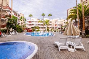 Πισίνα στο ή κοντά στο Mambo Palm-Mar apartment