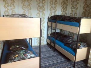 Postel nebo postele na pokoji v ubytování Hotel Eulenspiegel - Das Erlebnishotel in Riesa