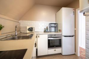 Kuchnia lub aneks kuchenny w obiekcie Casa Anselmsson - Your Dream Duplex Escape with a pool
