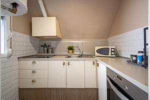 Kuchnia lub aneks kuchenny w obiekcie Casa Anselmsson - Your Dream Duplex Escape with a pool