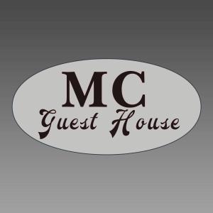 a sticker with the text mci guest house at MC Guest House in Rome