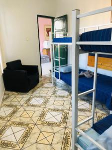Postel nebo postele na pokoji v ubytování Tamboleiros Hotel & Hostel
