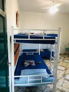 Postel nebo postele na pokoji v ubytování Tamboleiros Hotel & Hostel