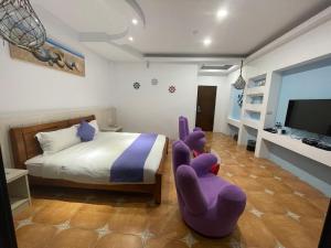 Letto o letti in una camera di Zi Jìng Fang Inn