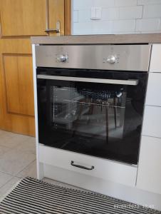 Televízia a/alebo spoločenská miestnosť v ubytovaní SnD Rentals -Boutique apartments