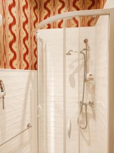 Kúpeľňa v ubytovaní Le 1825, une suite luxueuse au coeur de la ville