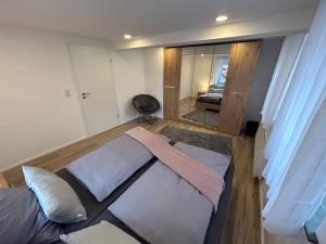Postel nebo postele na pokoji v ubytování Ferienwohnung zur Fröhlichkeit