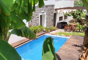 Bazén v ubytování Villa Canaria piscina jacuzzi jardín nebo v jeho okolí