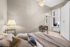 Llit o llits en una habitació de Unique Oslo/Vika Apartment