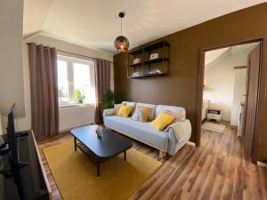 Et opholdsområde på Apartamenty MALICIA