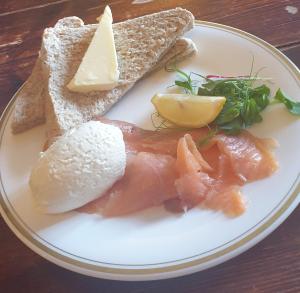 a plate of food with bread and cheese on it at Number 2 at The Red Lion in Huntley