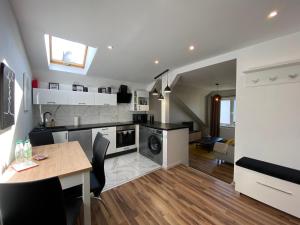 Køkken eller tekøkken på Apartamenty MALICIA