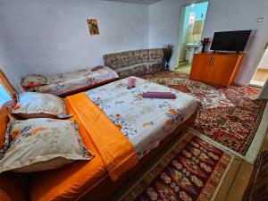 Säng eller sängar i ett rum på Casa Rozalia