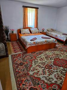 Кровать или кровати в номере Casa Rozalia